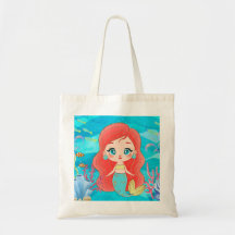 Vacker RED HAIR-sjöjungfru som leker i havet