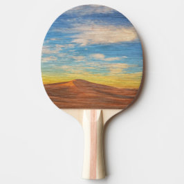 Vacker soluppgång över sanddyner på trä pingisracket