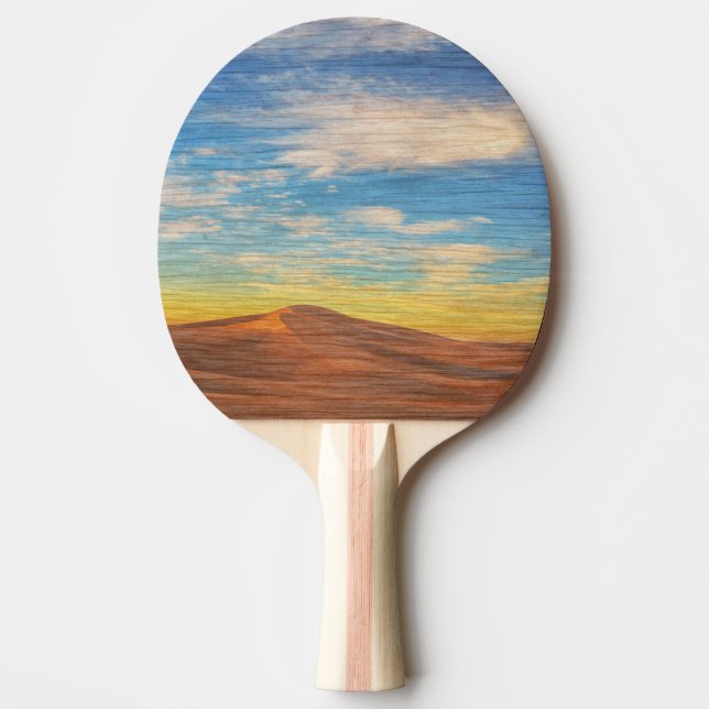 Vacker soluppgång över sanddyner på trä pingisracket (Framsidan)