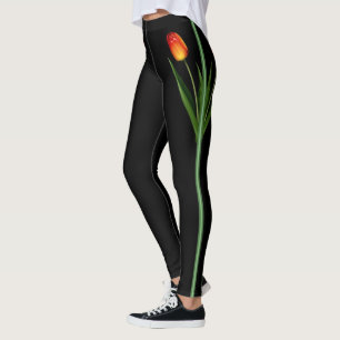 Vacker tulpanblomma på svart leggings