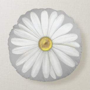 Vacker tusenskönsblomma på ljust grå rund kudde