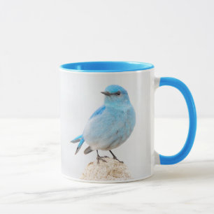 Vackert berg Bluebird på en stump Mugg
