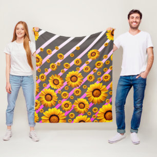 Vackert gula blommor på grått, rosa rand fleecefilt
