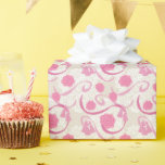 Vackert i rosa  presentpapper<br><div class="desc">Vackert i rosa - utsmyckning med rosa sidenblommor,  tofsar och band på vit spets.</div>