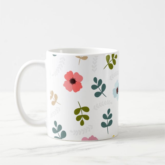 Vackert olika färgade blommor och grön lövverk kaffemugg (Vänster)