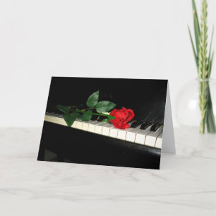 Vackert Röd ros på Piano Kort