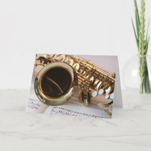 Vackert saxofonmusikinstrument tack kort