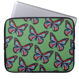 Vackra utsmyckade färgglada fjärilar på grön bakgr laptop fodral