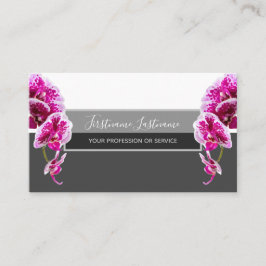 Vackra violetta rosa orchid-blommar på grått visitkort