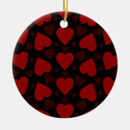 Vackrött hjärta mönster på svart julgransprydnad keramik