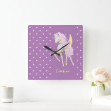 Väggklocka med en söt bild av en enhörning.