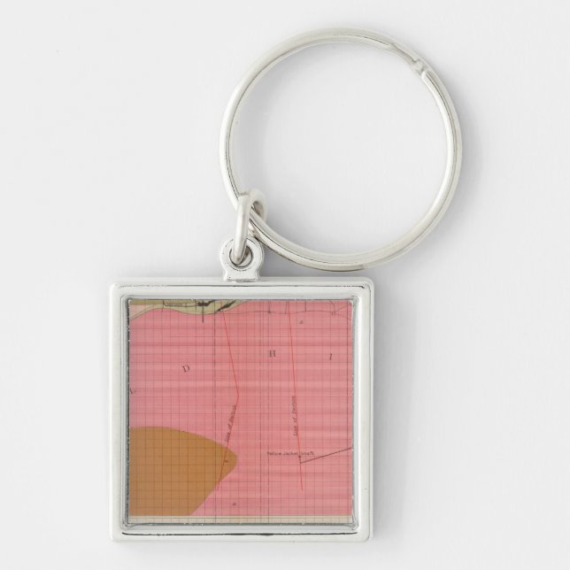 Vågrät avsnitt av stamloden söderut fyrkantig silverfärgad nyckelring (Framsidan)