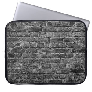 vågrät del av svart målad tegelvägg,br laptop fodral