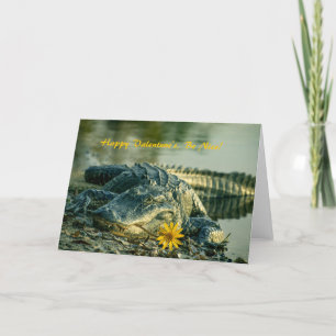 Valentinalligator med blomman helgkort