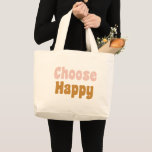 Välj Lycklig inspirationsincitattypografi för retr<br><div class="desc">Packa upp i stil med den här jumbo-påsen och det positiva budskapet och påminnelsen - Välj Lycklig - i roligt  rosa och guld-brev</div>