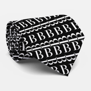 Väljer initialt brev B för monogramen, Slips