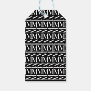 Väljer initialt brev M för monogramen, Presentetikett