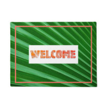 Välkomstdörr Mat vid den tropiska Grönten Löv