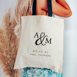 Välkomsthälsning från Ampersand Monogram Bröllop Tygkasse<br><div class="desc">Enkel och chic bröllop välkomstfunktion för tote bags som initialer har arbetat in i en monogramdesign,  gått med med ett dekorativt skriptampersand. Anpassa med ditt bröllop-datum och din plats under i tidslasser. Perfekt som favoriter eller hotellpresentsäckar.</div>