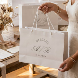 Välkomstpåse med monogram för destinationbröllop i