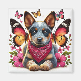 Valp av rasen Heeler omgiven av fjärilar och blomm Magnet