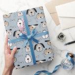 Valpskära Hundar Presentpapper<br><div class="desc">Puppy Love Dogs presentpapper visar söta vita och ljusbruna doodlehundar av olika raser mot en ljusgrå bakgrund. Denna lekfulla design ger en touch av glädje till alla presenter,  perfekt för hundälskare!</div>