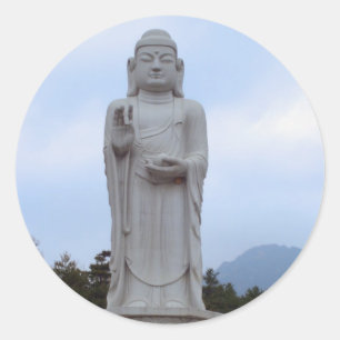 Välsignelser - stenBuddha staty i Korea Runt Klistermärke