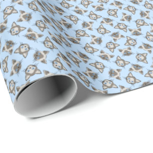 Vänder mot den Siamese blått synade katten Presentpapper
