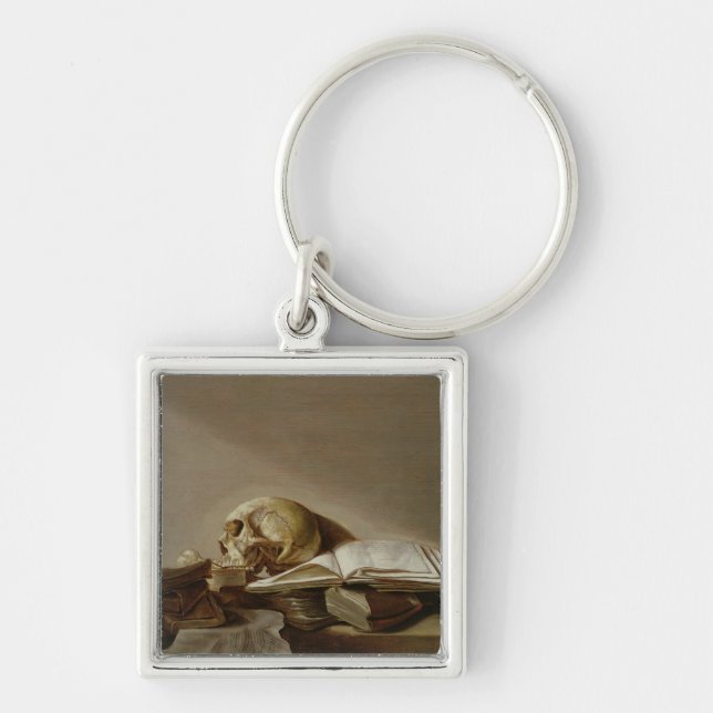 Vanitas 2 fyrkantig silverfärgad nyckelring (Framsidan)