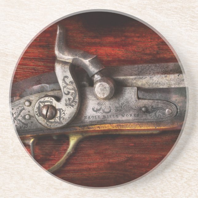 Vapen - gevärarbeten underlägg sandsten (Framsidan)