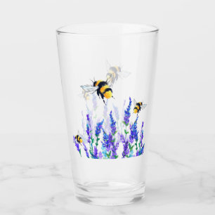 Vår blommor och flygglas för bin glaskopp