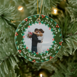 Vår första jultomte tillsammans med ett foto julgransprydnad keramik