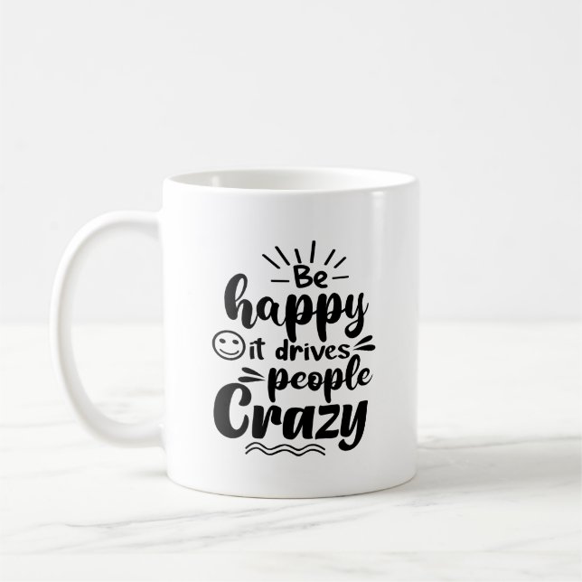Var Lycklig det driver folk i Crazy Typography Mug Kaffemugg (Vänster)