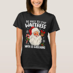 Var snäll mot Waitress Santa tittar på Christma T Shirt<br><div class="desc">Var snäll mot Waitrestomten som tittar på julen Julafton 1</div>