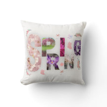 Vårblommig typografisk kastkudde
