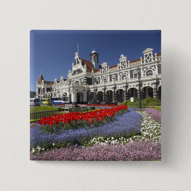 Vårblommor och historisk järnvägsstation, knapp (Framsida)