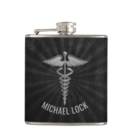 Vårdar den medicinska symbolpersonligen för silver fickplunta