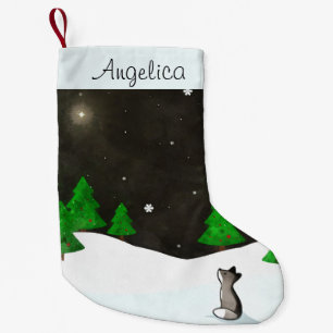 Varg som Stargazing på snöig vinternattvattenfä Liten Julstrumpa