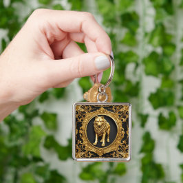 Varg, svart och guld, ram fyrkantig silverfärgad nyckelring