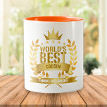 Världens bästa kusin kul guld Två-Tonad mugg<br><div class="desc">Den perfekta presenten för världens bästa kusin. Anpassa namnet för att skapa en unik gåva. Ett perfekt sätt att visa dem hur fantastiska de är varje dag. Designad av Thisisnotme©</div>