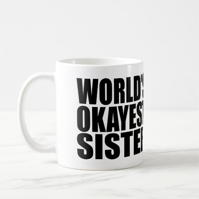 VÄRLDENS OKAYEST SISTER. KAFFEMUGG (Vänster)