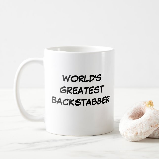 "Världsmästare Backstabber" Mugg (Med munk)