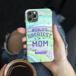 Världsmästare Mamma Mors dag Grönt Glitter<br><div class="desc">Världsmästare Mamma Mors dag Grönt Glitter iphone case har en färgstark modern vattenfärgbakgrund i abstrakt och grönt med mousserande lila. I mitten står texten "Världsmästare Mamma" i modern typografi med personligen namn nedanför. Anpassa genom att redigera texten i textrutorna. Perfekt till Mamma för födelsedag, jul, Mors dag och helgdag. Designad...</div>