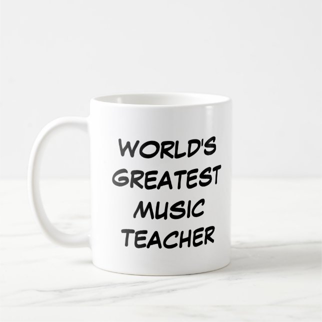 "Världsmästare Music Teacher Mugg" Kaffemugg (Vänster)