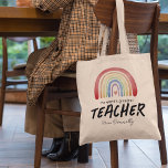 Världsmästare Teacher Rainbow Tygkasse<br><div class="desc">Personligens läraruppskattning av väskan med en vattenfärgad boho-regnbåge,  ett rött hjärta,  det söta ordspråket "den världsmästare läraren" och deras namn.</div>