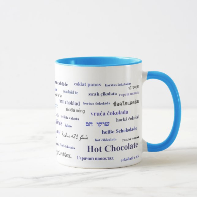 Varm chokladmugg i olika språk (i marin) mugg (Höger)
