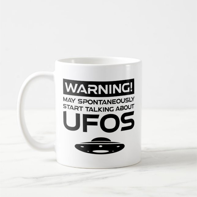Varning kan spontant börja prata om UFO Kaffemugg (Vänster)