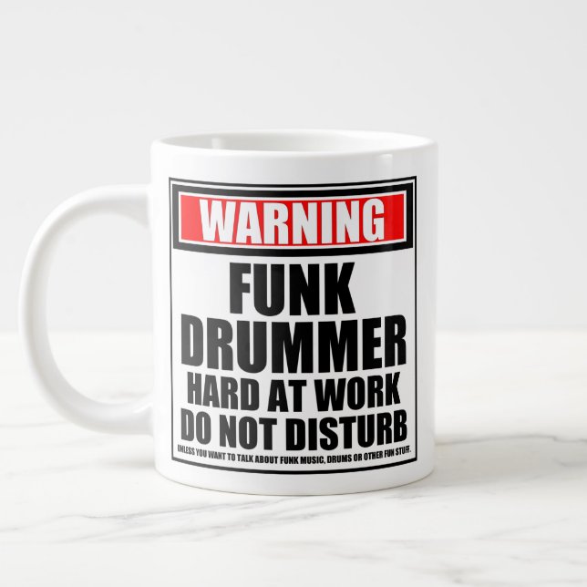 Varningsfunktionen drummer hard at Work stör inte Jumbo Mugg (Vänster)
