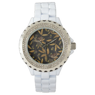 Varor och bokstäver på svart armbandsur