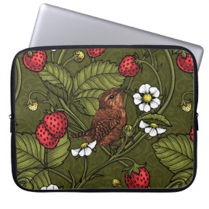 Varor och jordgubbar på mörk grönt laptop fodral